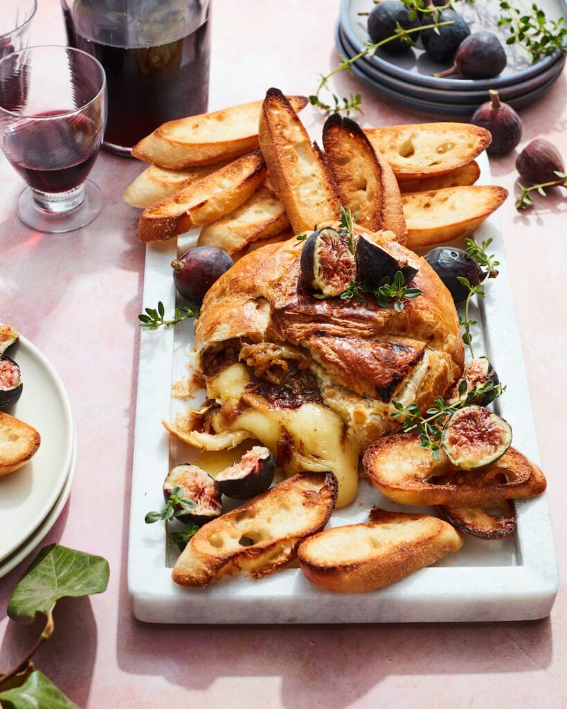 Christmas Dinner Ideas Baked Brie with Fig Jam and Caramelized Onions from www.whatsgabycooking.com (@whatsgabycookin)