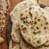 Homemade Naan Bread with Garlic Butter from www.whatsgabycooking.com (@whatsgabycookin)